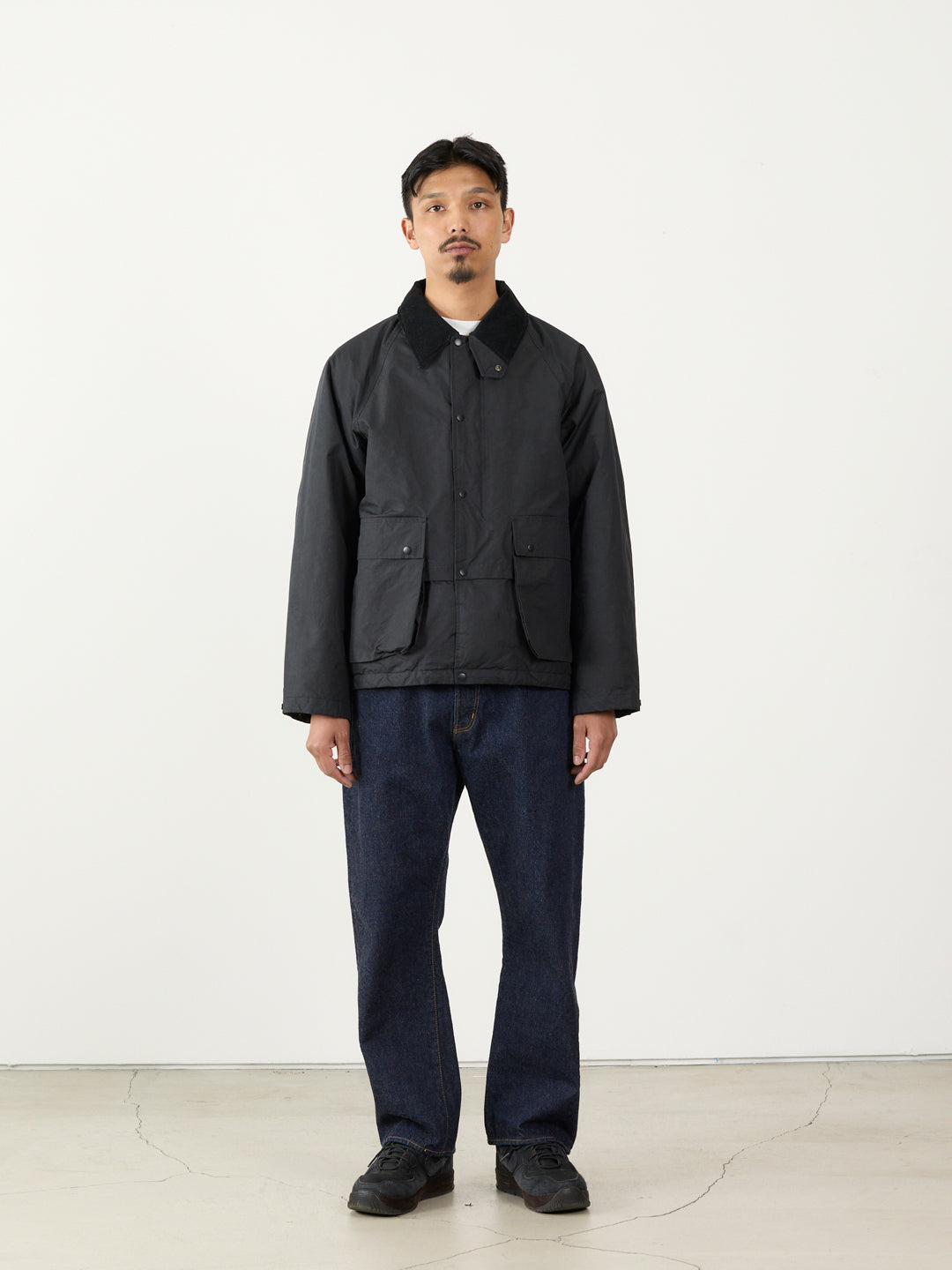 撥⽔コーディングポリエステルハン ティングダウンJKT