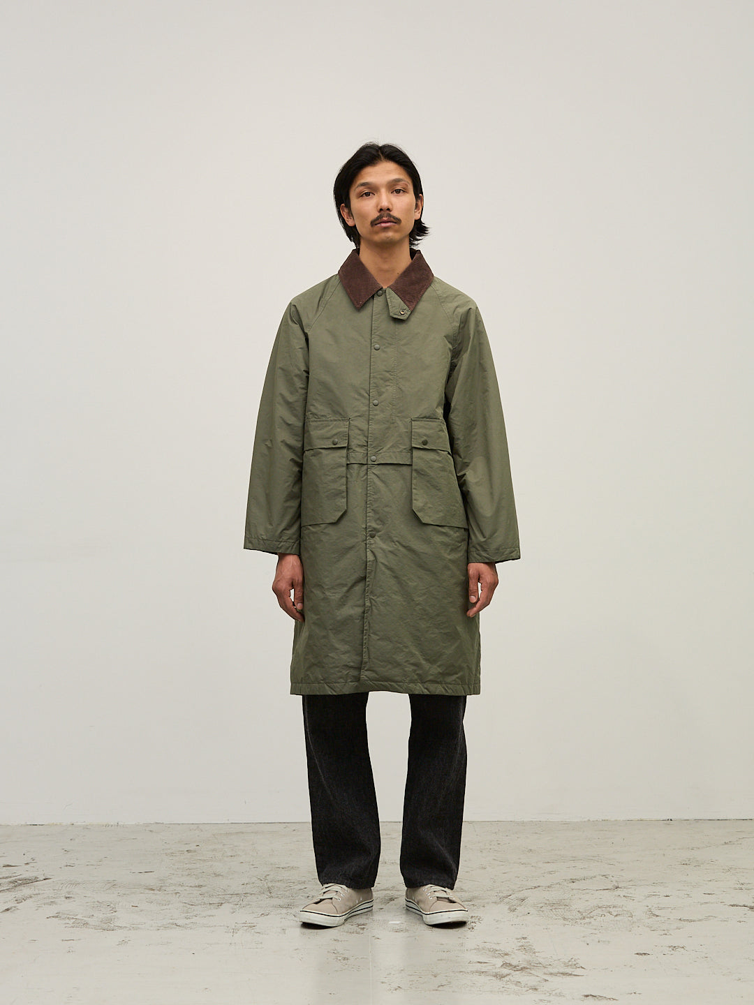 撥⽔コーディングポリエステルハン ティングダウンロングJKT