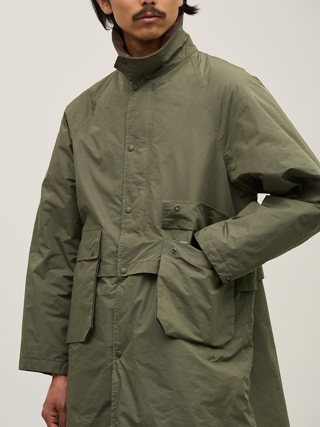 撥⽔コーディングポリエステルハン ティングダウンロングJKT